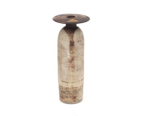 Hans Coper (1920-1981) Bottle with disc top lip, stoneware, layered engobes over a textured body, the neck and disc top lip w