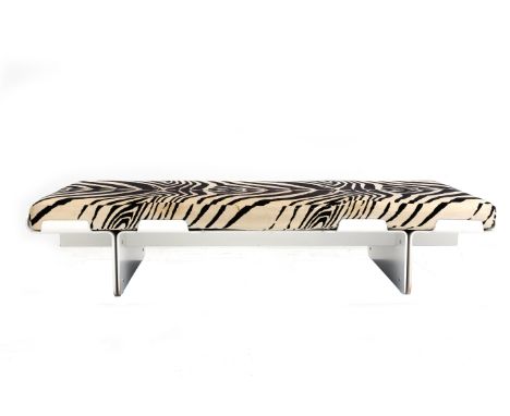 Space Age A daybed composed of white lacquered bent plywood elements, the upholstery with zebra print (some wear), in the sty