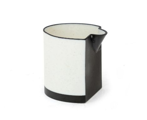 Bodil Manz (1943) A partly black glazed glazed oval porcelain pitcher-shape, signed underneath. Provenance: the estate of Ams