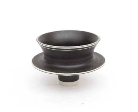 Johan Broekema (1943-2010) A porcelain bowl on foot, black glazed with unglazed lines, circa 1990, marked to the inside of th