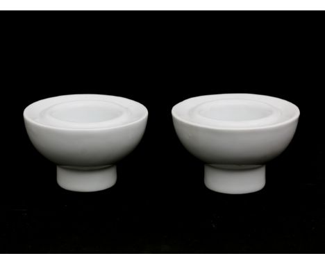 Jan van der Vaart (1931-2000) Two white glazed porcelain candlesticks, produced in the artist's own workshop, one with signat