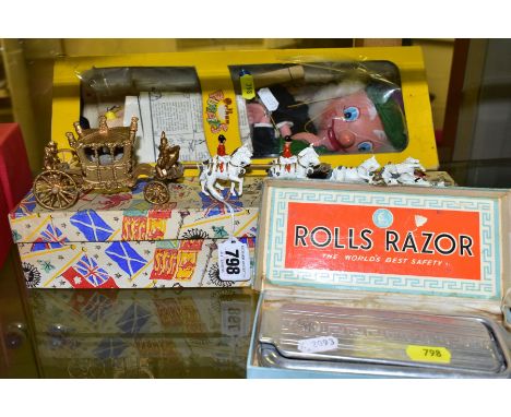 A BOXED PELHAM PUPPET SM MACBOOZLE IN YELLOW WINDOW BOX, cellophane ripped, a boxed Rolls Razor, (poor condition) and a Cresc