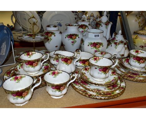 A THIRTY FOUR PIECE ROYAL ALBERT OLD COUNTRY ROSES TEA SET AND FOUR VASES, comprising a coffee pot (second with factory fault