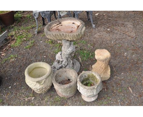 A COMPOSITE BIRDBATH IN THE STYLE OF A TREE TRUNK, height 61cm together with a tree trunk base (missing top) and three variou