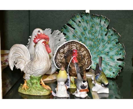 SEVEN GOEBEL DECORATIVE BIRD SCULPTURES, comprising of a Peacock with impressed initials SB, approximate height 23cm, a Turke
