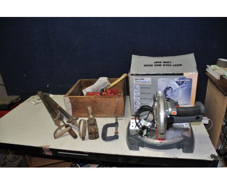A CHALLENGE XTREME MMS5788 MITRE SAW with laser and box (PAT pass and working), three vintage stirrup pumps, a plastic toolbo