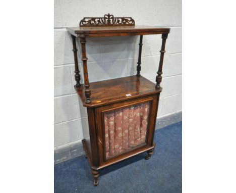 A LATE VICTORIAN WALNUT AND AMBOYNA CROSSBANDED MUSIC CABINET, the raised shelf with a raised open fretwork gallery, supporte