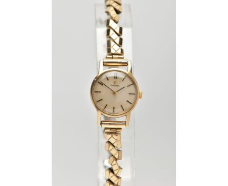 A LADIES 9CT GOLD 'OMEGA' WRISTWATCH, round gold dial signed 'Omega', baton markers, black hands, within a plain polished cas