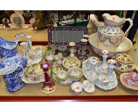 A GROUP OF CERAMIC DRESSING TABLE SETS AND ITEMS, to include a black and white striped Grimwades dressing table set with styl