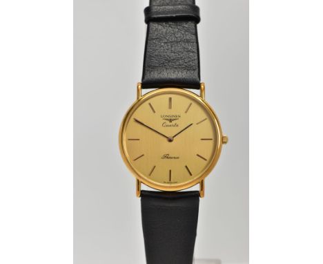 A GENTS 'LONGINES' QUARTZ WRISTWATCH, round gold dial signed 'Longines, Quartz Presence', gold Baton markers, black hands, go