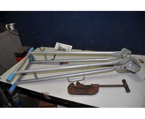 AN EGA-CUT PIPE CUTTER and a metal pipe bending  stand with 22mm, 28mm and 15mm attachments also a Stanley Shoulder brace and