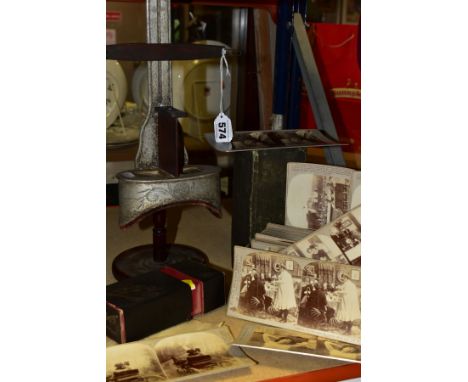 A STEREOSCOPIC PHOTOGRAPHIC VIEWER BY THE 'FINE ART PHOTOGRAPHERS PUBLISHING Co, together with a box of stereoscopic photogra