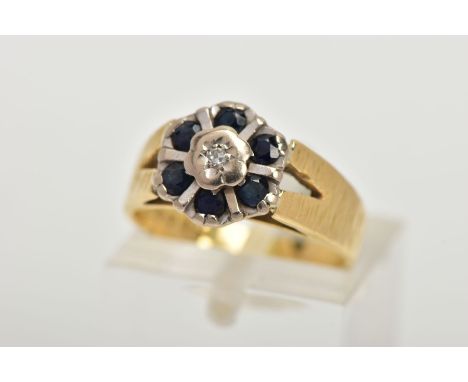 A SAPPHIRE AND DIAMOND CLUSTER RING, flower shape cluster set with a central single cut diamond, within a surround of deep bl