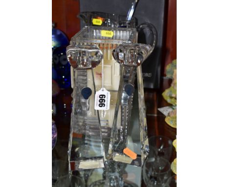 FOUR PIECES OF WATERFORD CRYSTAL, comprising a boxed pair of Metra candlesticks, height 20cm, a 'Marquis 'Cubist' 8  square H
