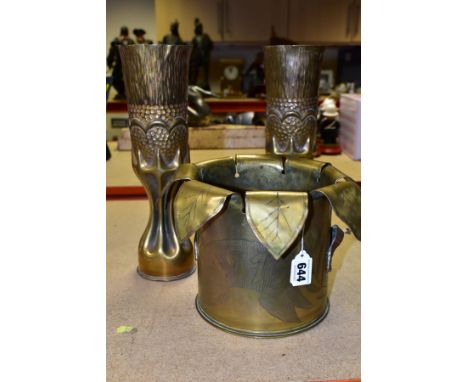 TRENCH ART SHELL CASES, comprising a French 155mm case, dated 1915 to the base, the case is decorated with initials GR 1917 a
