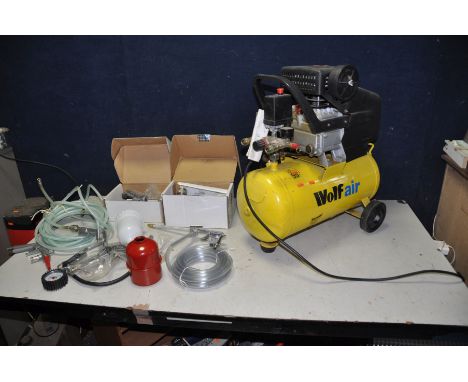 A WOLF AIR SIOUX 3 COMPRESSOR with 24ltr tank, a DeVilbiss spray gun, another spraygun, tyre inflator, a Tex orbital air sand