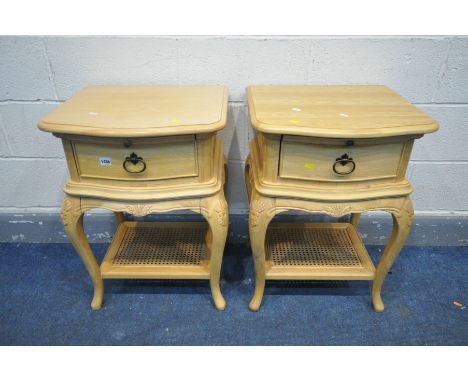 A PAIR OF 'WILLIS AND GAMBIER' LIGHT OAK SINGLE DRAWER BEDSIDE CABINETS, with a brushing slide, on cabriole legs united by an