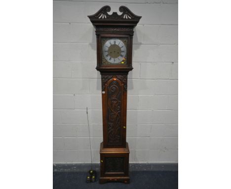 AN OAK EIGHT DAY LONGCASE CLOCK, Whitehurst of Derby, the hood and trunk with carved foliate decoration, the glazed door encl