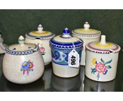 FIVE POOLE POTTERY PRESERVE POTS WITH COVERS, four with impressed backstamps one with a transfer print backstamp, two are imp
