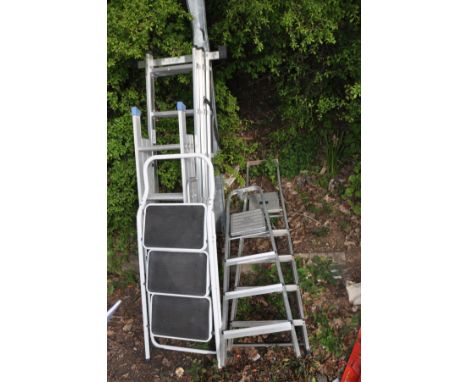 A LOHO 3 SECTION 3 WAY ALUMINIUM COMBINATION LADDER together with a 3m three section loft ladder and three other step ladders