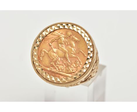 A MOUNTED FULL SOVEREIGN RING, full sovereign dated 1912, within a diamond cut pattern surround, openwork shoulders depicting