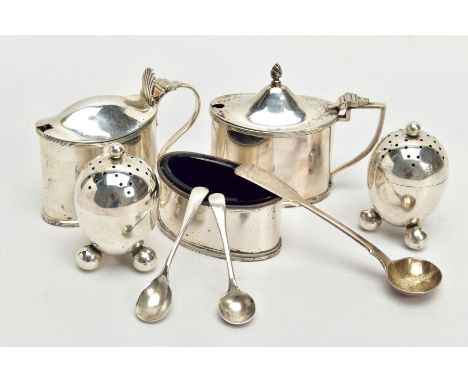 A SELECTION OF SILVER CONDIMENTS, to include a pair of egg shaped pepperettes each of a plain polished design raised on three