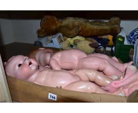 TWO GERMAN BISQUE HEAD BABY DOLLS AND A BOX OF SOFT TOYS, the two dolls both with composition bodies comprising an Armand Mar