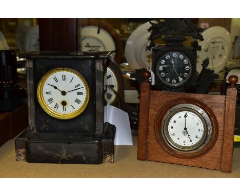 FIVE MANTEL CLOCKS, comprising a spelter clock with warrior motifs, the cast metal and enamel dial having Roman numerals, run