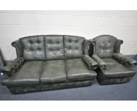 A GREEN LEATHER BUTTONED WING BACK TWO PIECE LOUNGE SUITE, with removable seat and back cushions, comprising of a three seate