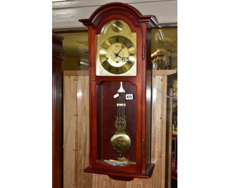 A 1980S MAHOGANY FINISH AMS EIGHT DAY WALL CLOCK AND THREE OTHER CLOCKS, the wall clock with brass dial, Roman numerals, grid