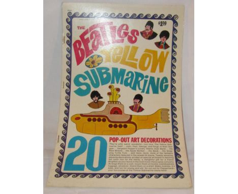 The Beatles Yellow Submarine Pop Out Art Book 1968 and Beatles Panel Poster 1964 formerly the property of Hunter Davis The Be