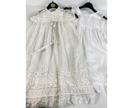 A vintage silk and lace christening gown with cotton under slip with embroidery detail to hem. Fine lace panels to yoke and b