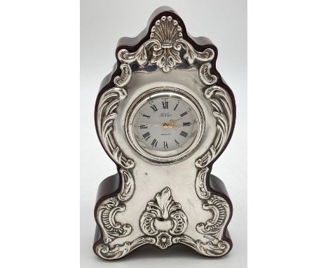 A dark wood cased silver fronted decorative quartz mantel clock by R. Carr. Of classical design, fully hallmarked to front Sh