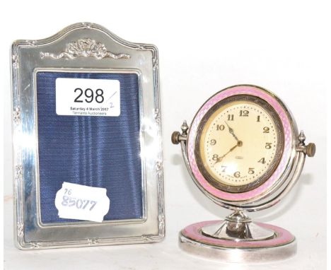 Silver photograph frame and a silver and pink enamel boudoir clock 
