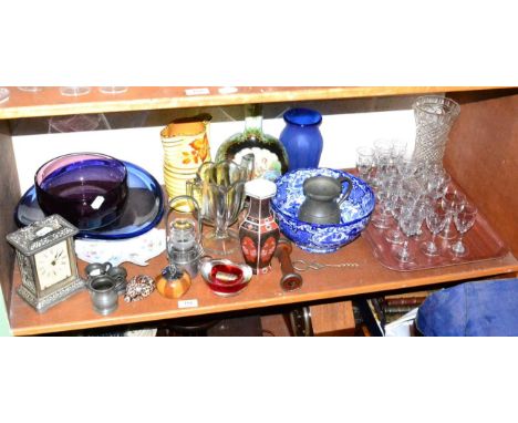 A shelf of assorted ceramics and glassware 