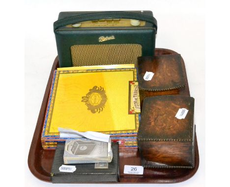 A part box of Havana Partagas cigars, two Teofarnni & Co oak cigarette cases; a Roberts Revival radio; playing cards (qty) 