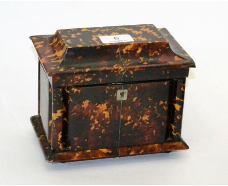 A tortoiseshell tea caddy 