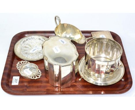 Miscellaneous silver including a wine coaster, by F. C. Sheffield, 1957; a tea caddy, Birmingham, 1910, a sauce boat, tea str