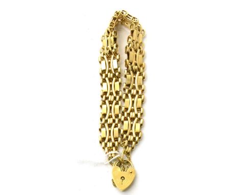 A 9ct gold fancy gate link bracelet with 9ct gold padlock clasp 26.94g gross.