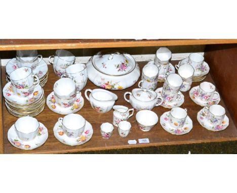 A shelf of Royal Crown Derby 'Derby Posies' tea and coffee wares