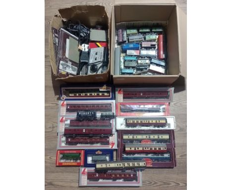 2 boxes of model railway items to include track, controllers and boxed rolling stock (including hornby, Bachmann &amp; Lima e