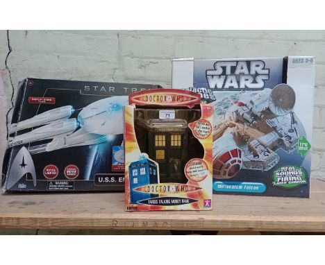 3 boxed toys to include a Doctor Who tardis talking money bank, a Star Wars millennium falcon and a Star Trek U.S.S. Enterpri