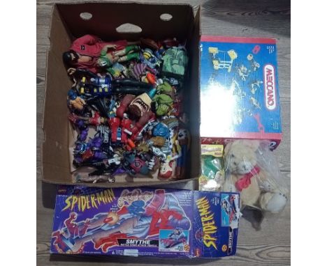 A box of mixed toys including Spiderman Smythe, Steiff bunny, vintage Meccano set, Thundercats, Ninja Turtles, Ghostbusters e