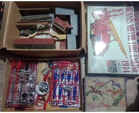 A box of model railway buildings, an up and over jocky game and a Dennis motor fire-engine unbuilt model in box. 