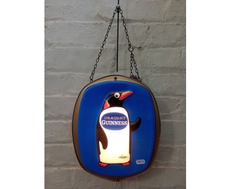 A vintage Guinness double sided illuminated sign, length 32cm.Material:- PlasticP&P:- no in house P&P available