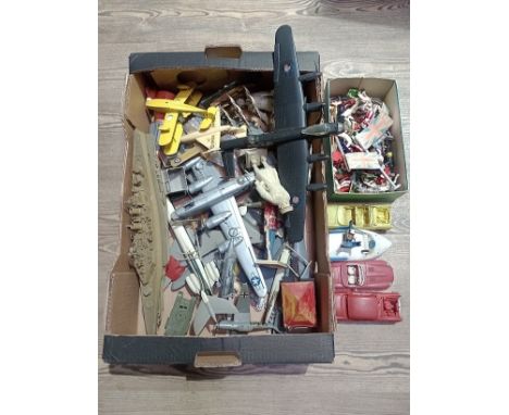 A box of vintage toys and models to include toy soldiers etc. 