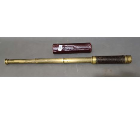 A vintage 3 draw brass and leather bound telescope. 