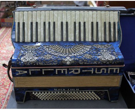 An Estrella Artists Super Four model piano accordion. 