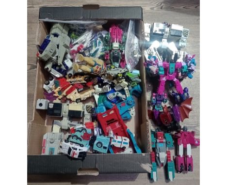 A box box containing vintage Transformers toys and KO Transformers toys.P&P:- In-house p&p not available on this lot.