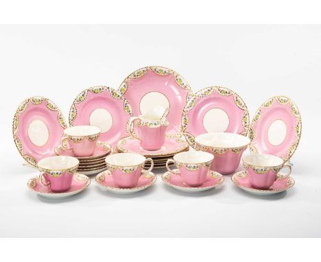 CROWN PINK DELPHINE CHINA TEA SERVICE FOR TWELVE, comprising milk jug, slops bowl, bread and butter plates, tea plates, cups 